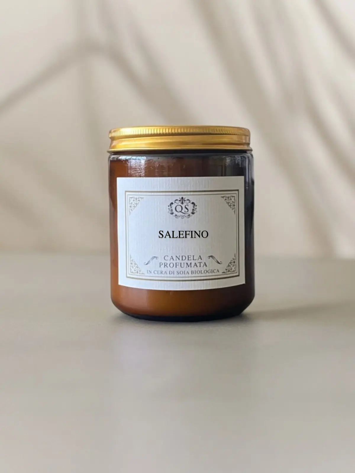 Candele in giara di vetro ambrato